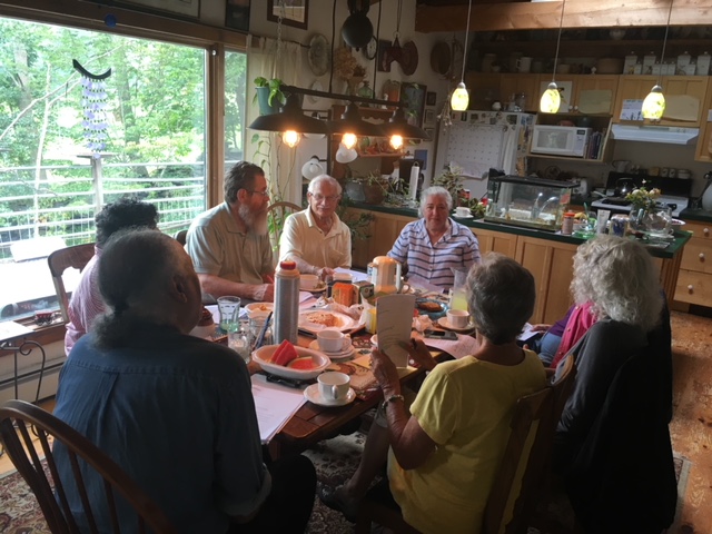 Volunteers helping a senior in the community
