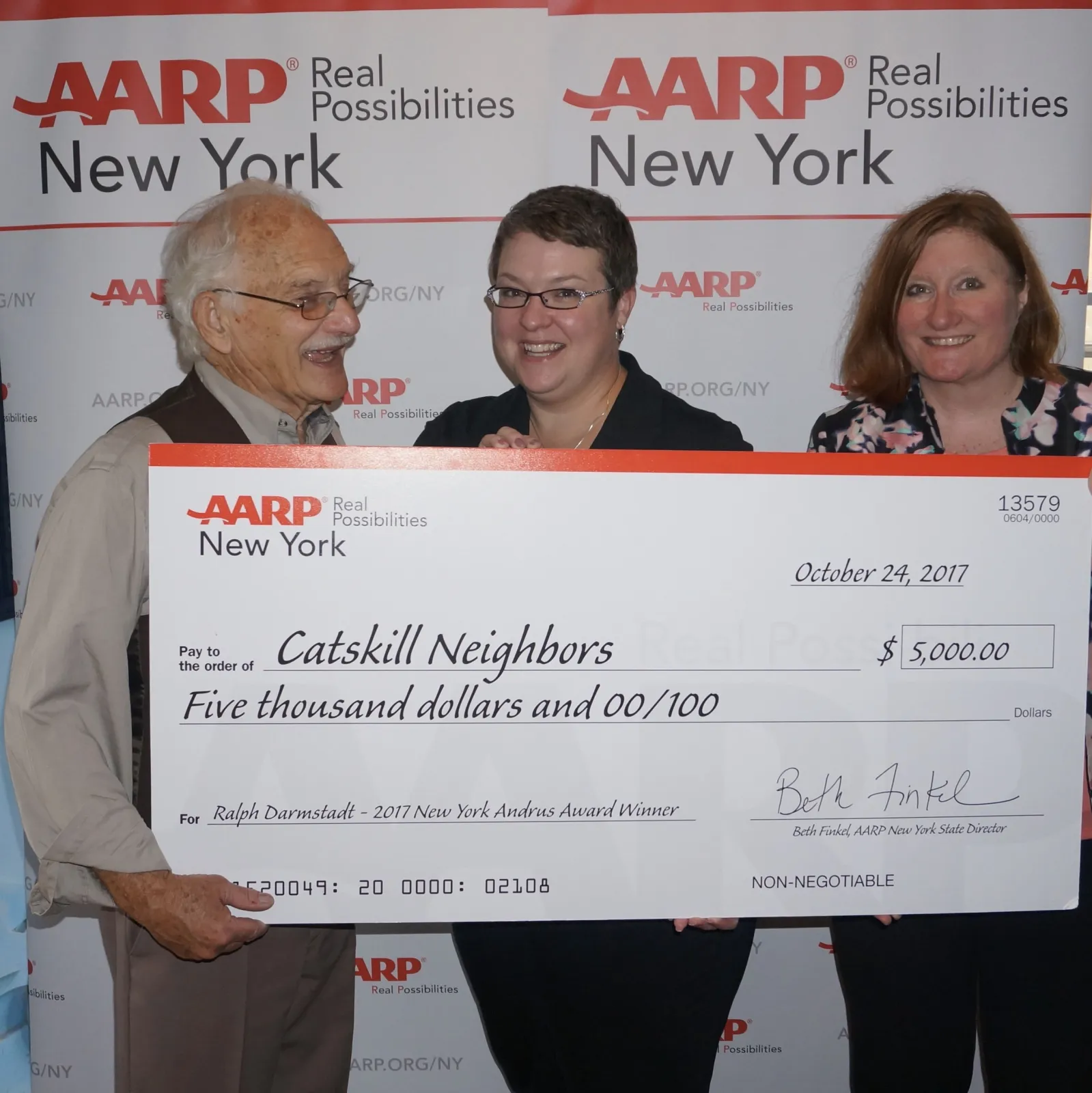 Ralph Darmstadt receiving the AARP Award